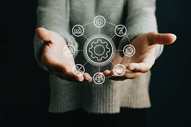 Hands Holding Integrated Industrial Process Management System