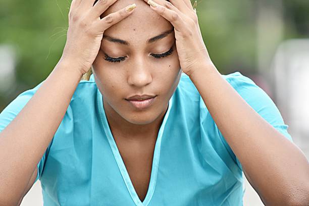 Hispanic Female Nurse And Stress